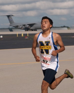 Kevin Portillo, the nephew of New York Air National Guard Staff Sgt. Fernando Cruz, races towards the finish line during a 5-K reace held June 29 at Stewart Air National Guard Base. 
Portillo won the race, held to raise funds for the New York National Guard Family Readiness Council, Inc. in a time of 17 minutes and 2 seconds.
Photo by Tech Sgt. Michael O&rsquo;Halloran, 105th Airlift Wing
