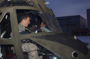 Capt. Eric Fritz (near side) and Canadian Capt. Martin LeFrancois sit in the cockpit of a New York Army National Guard&rsquo;s CH-47 &quot;Chinook&quot; outside of the Army Aviation Support Facility #2 in Rochester on 20 Jan. preparing for a three-hour night time fling operation.
Photo by Sgt. 1st Class Steven Petibone

